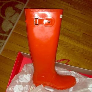 Brand new orange tall Hunter boots size 8